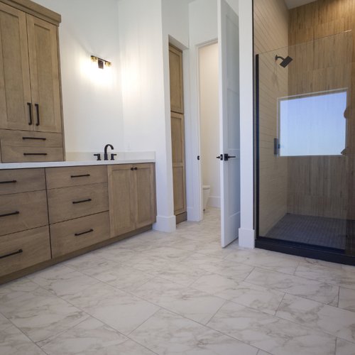 Beautiful bathroom remodel featuring new flooring by DBG Flooring in Yuma, AZ